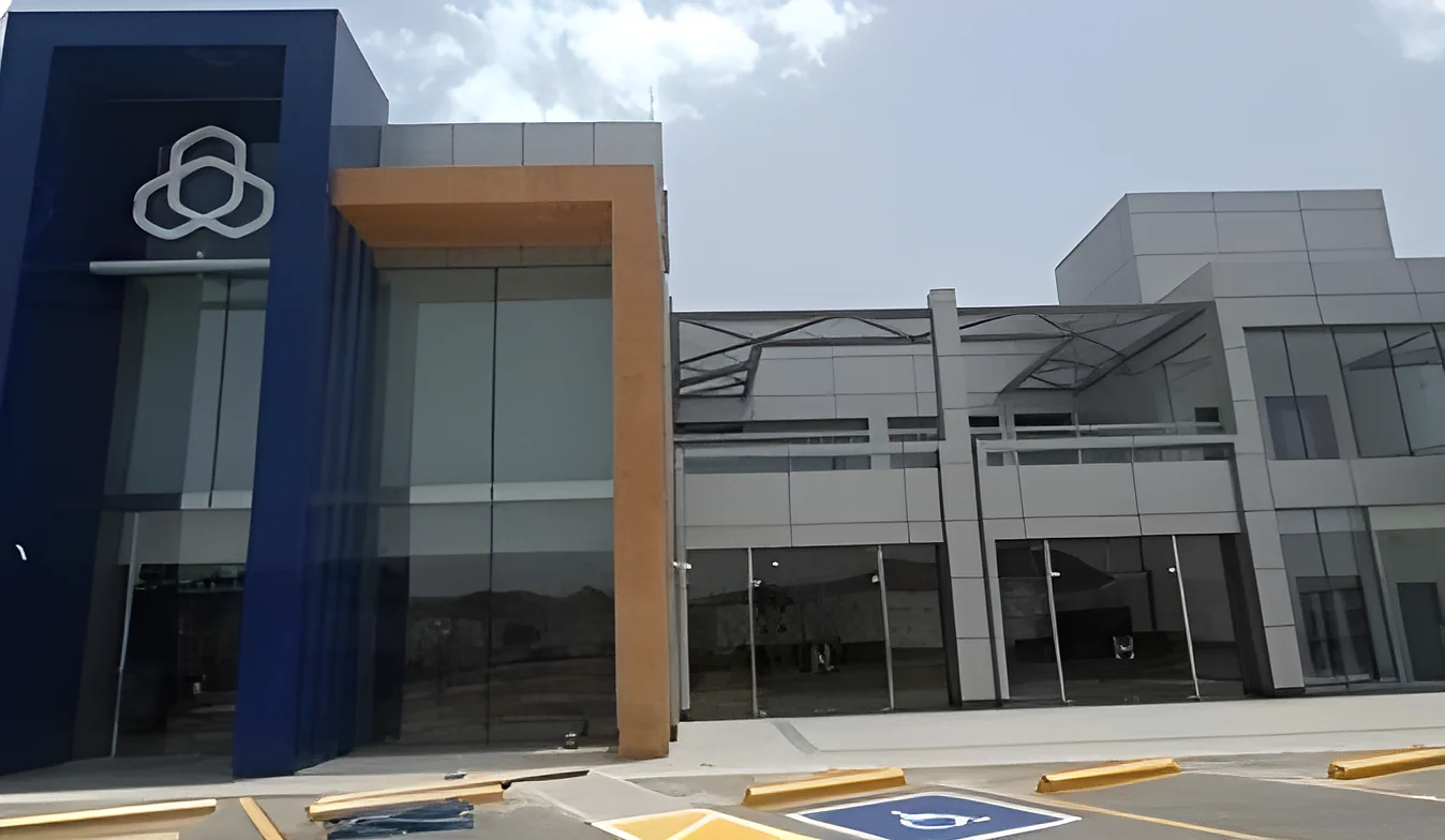 Bank Al Rajhi branch in Taif, its blue clad entrance portal